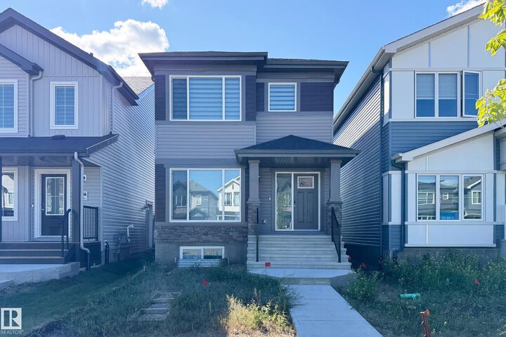 Property Photo:  7118 46A Street  AB T6T 2J1 