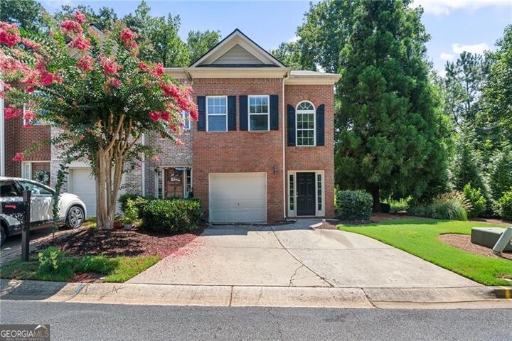 Property Photo:  950 Firethorne Pass  GA 30040 