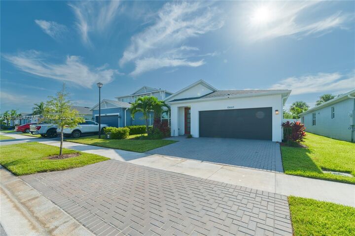 Property Photo: 10669 SW Gloriana St FL 34987