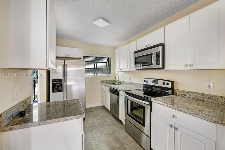 Property Photo:  1256 S Military Trl 924  FL 33442 