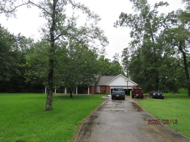 Property Photo: 5659 Dunromin Rd. TX 77630