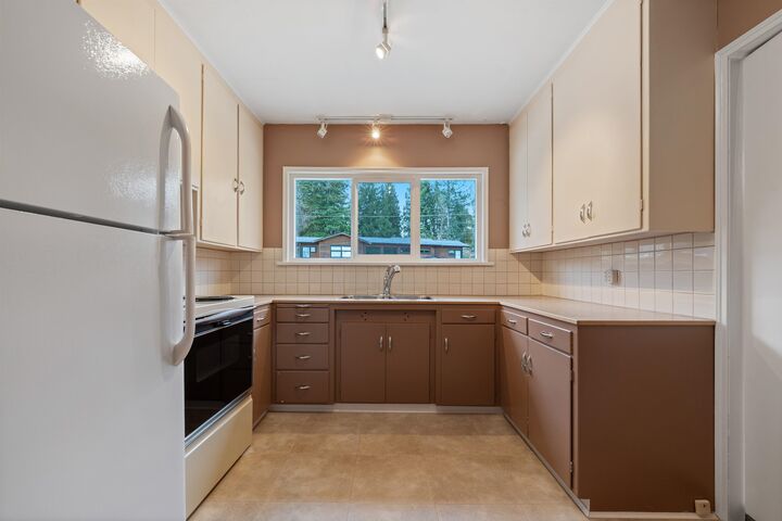 Property Photo: 3975 Highland Boulevard BC V7R 2Y7
