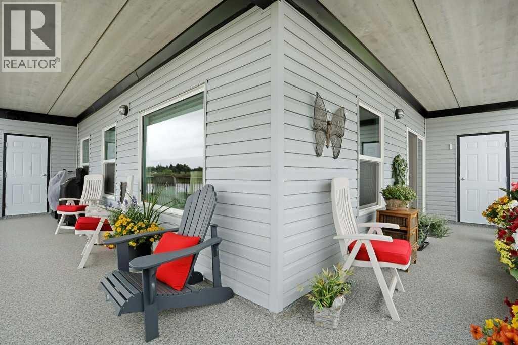 Property Photo:  499 Meadowlake Court East  AB T1R 0Y7 