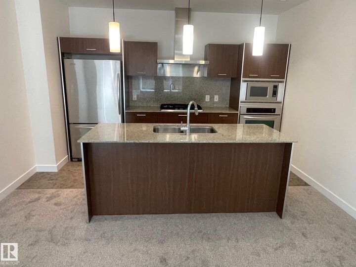 Property Photo:  2510 109 Street NW 110  AB T6J 2X1 