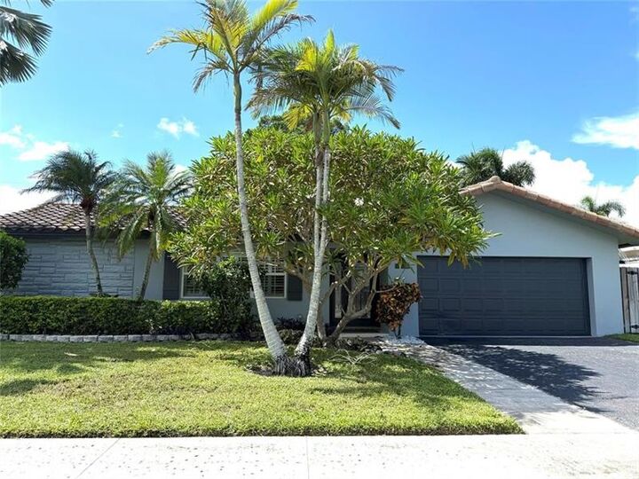 Property Photo:  105 Orchard Ridge Ln  FL 33431 
