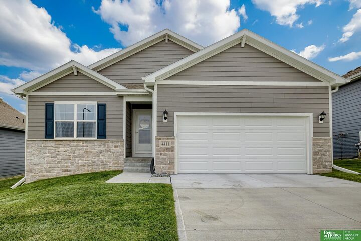 Property Photo: 4411 Schilling Drive NE 68123