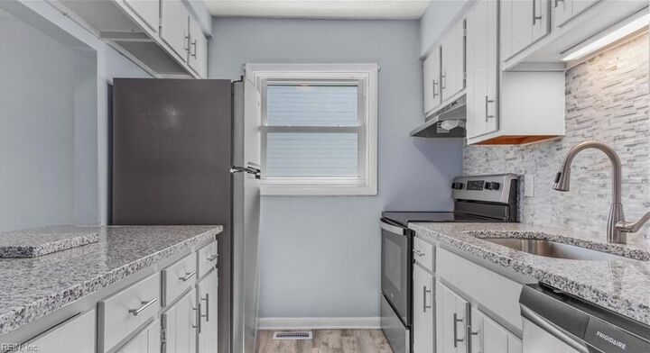 Property Photo:  737 W Ocean View Ave A  VA 23503 
