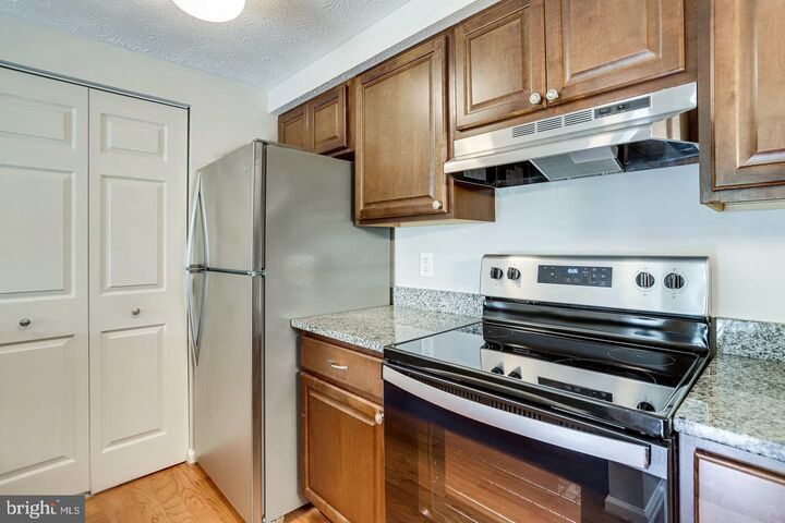 Property Photo:  8385 Brockham Drive H  VA 22309 