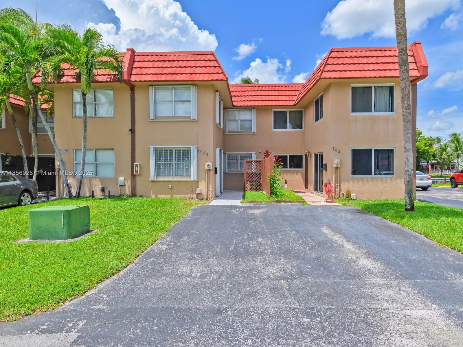 Property Photo:  7023 NW 169th St 7023  FL 33015 