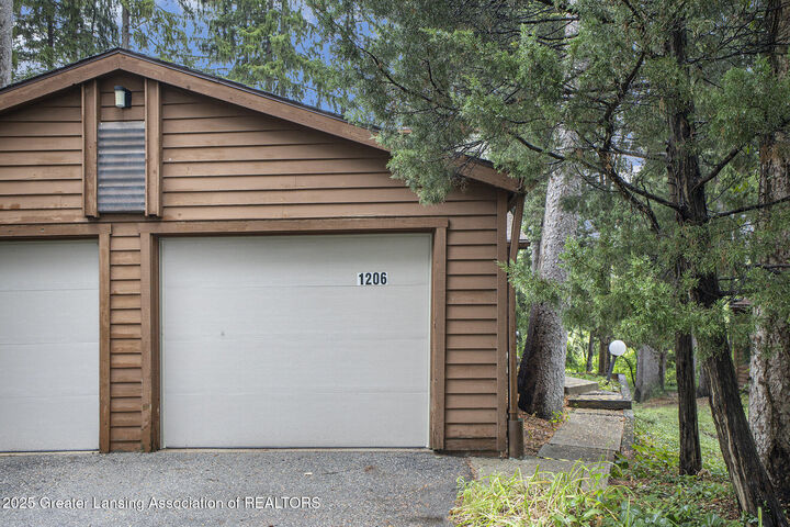 Property Photo:  1206 Academic Way  MI 48840 