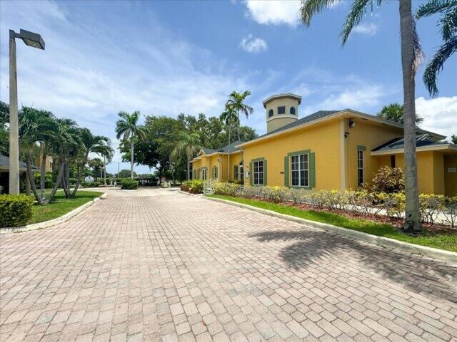Property Photo:  1104 Meadows Circle  FL 33436 