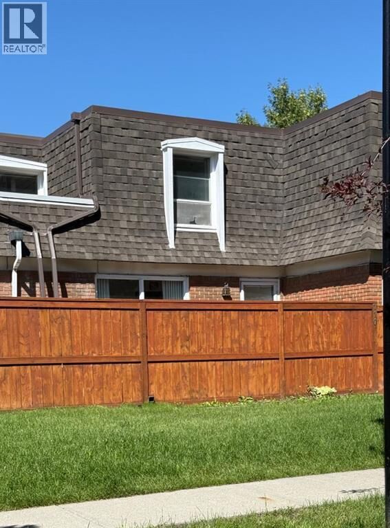 Property Photo: 330 Canterbury Drive Southwest AB T2W 1H6
