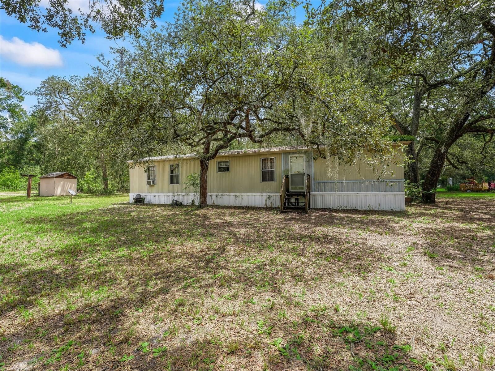 Property Photo:  11765 SW 47th Drive  FL 33597 