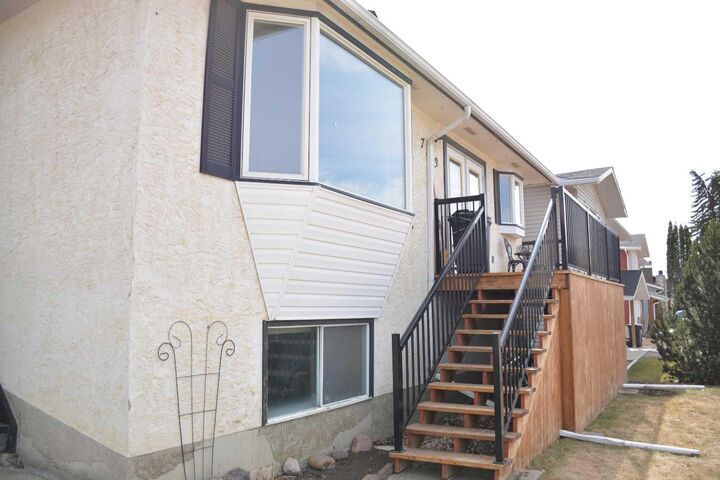 Property Photo:  7113 99 Street  AB T8S 1B3 