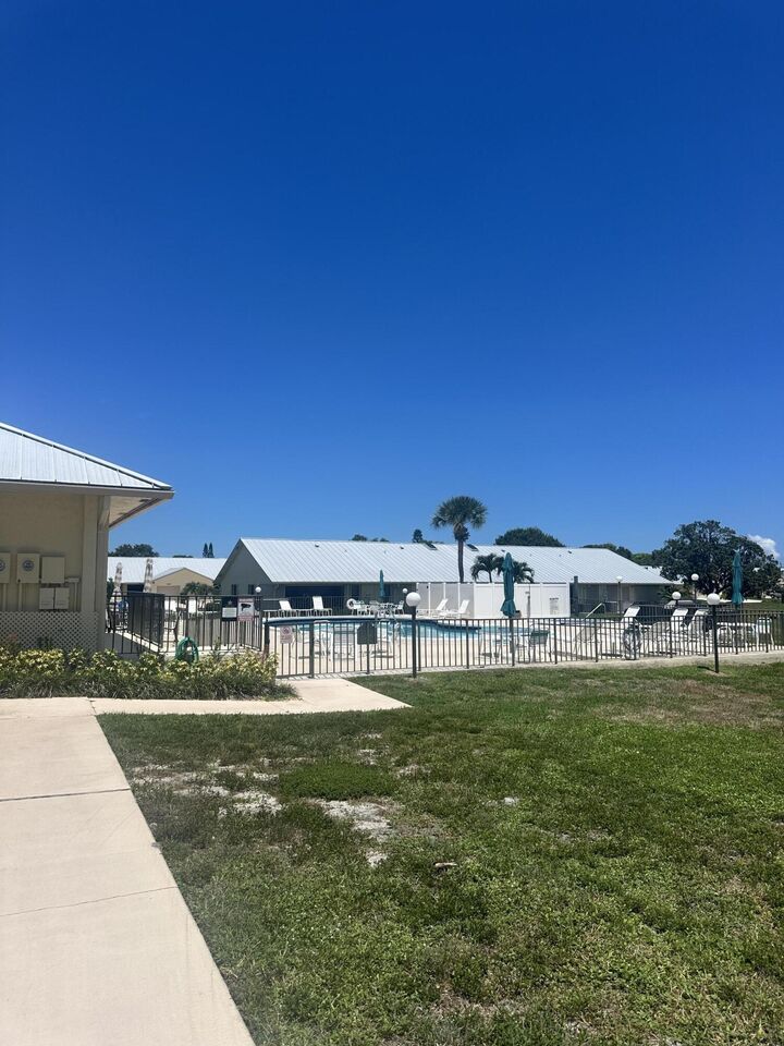Property Photo:  7648 SE Sugar Sand Circle  FL 33455 