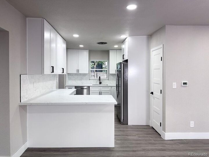 Property Photo: 1390 Lewis Street CO 80215