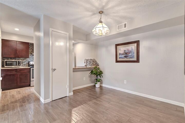 Property Photo:  10555 Turtlewood Court 414  TX 77072 