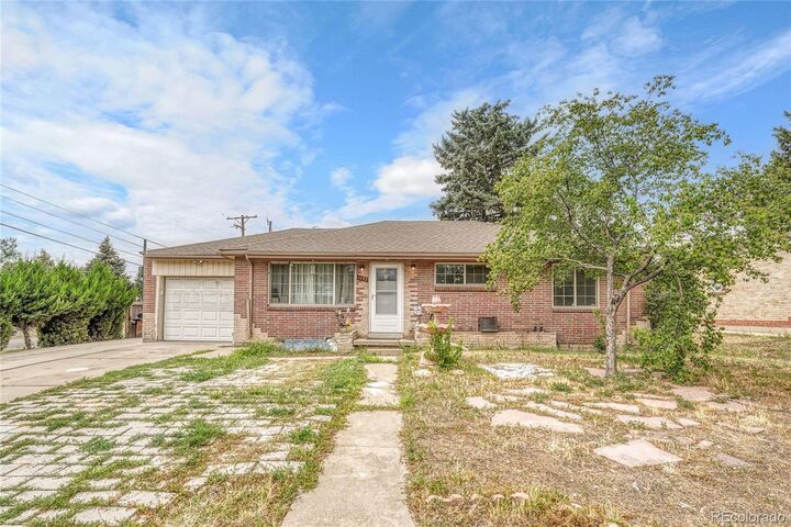 Property Photo:  1493 S Yates Street  CO 80219 