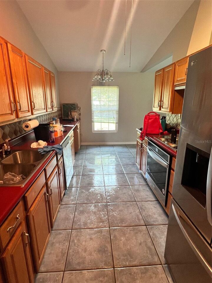 Property Photo: 203 Larkspur Court FL 34743