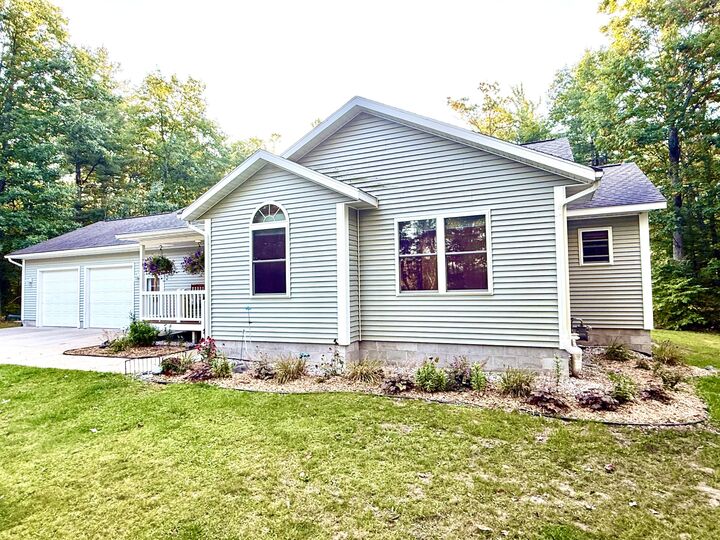 Property Photo: 4053 W Otsego Lake Drive MI 49735