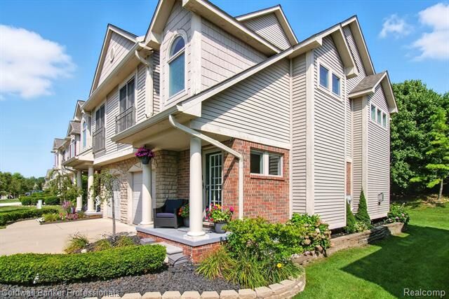 Property Photo:  50454 Beechwood Court 36  MI 48170 