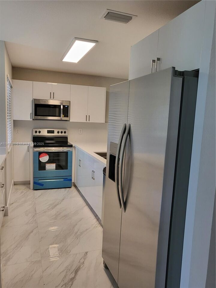 Property Photo: 22721 SW 88th Pl 3-19 FL 33190