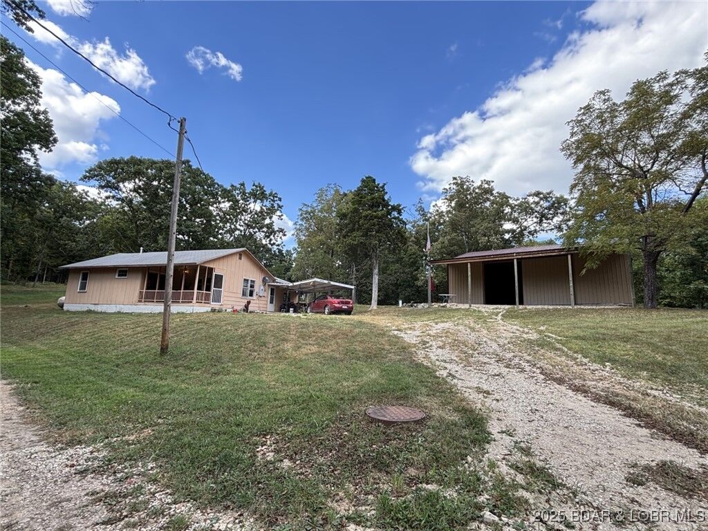 Photo de la propriété: 25151 Knotty Pine Road MO 65037