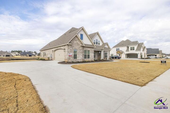 Property Photo:  402 Bristleleaf Path  GA 31047 