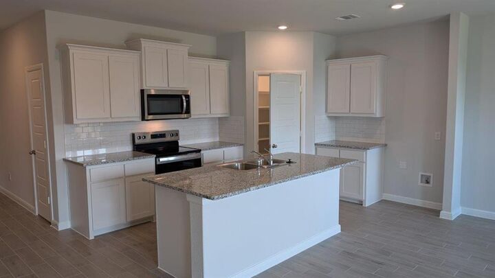 Property Photo:  960 Traction Trail  TX 76031 
