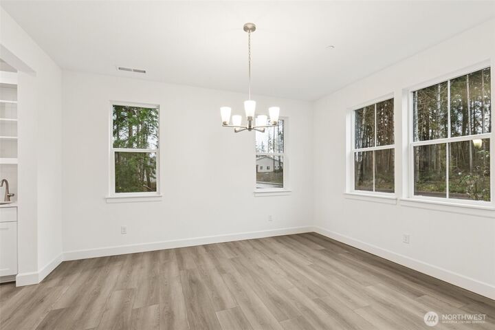 Property Photo:  10403  135th Avenue NE 106  WA 98258 