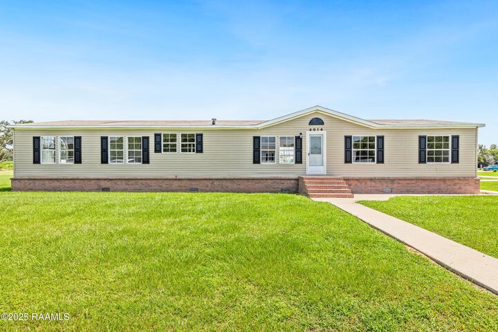 Property Photo:  4014 Rue Martine  LA 70560 