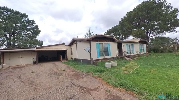 Property Photo:  1402 N Wheaton Street  NM 88101 