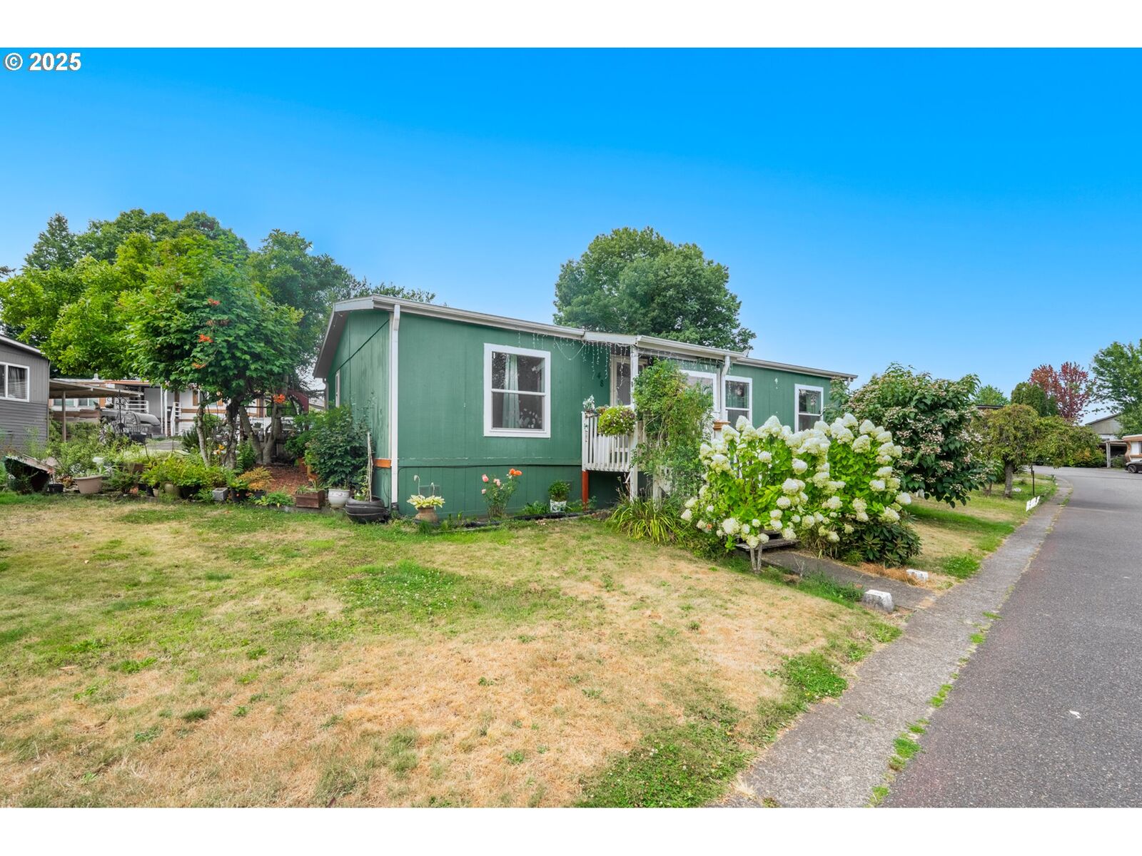 Property Photo:  2905 SE Palmquist Rd 48  OR 97080 