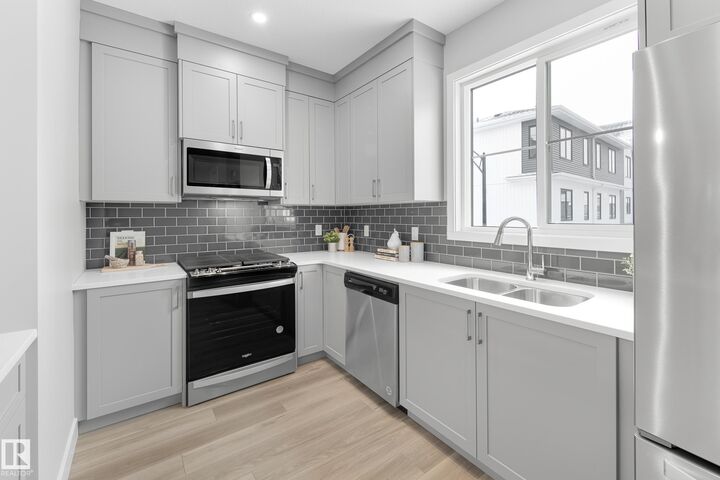 Property Photo: 6905 25 Avenue SW 6 AB T6X 3B7
