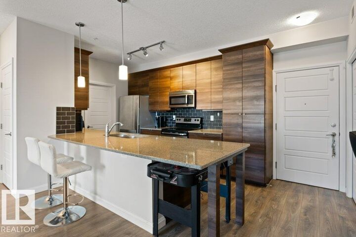 Property Photo: 2588 Anderson Way SW 216 AB T6W 0R2