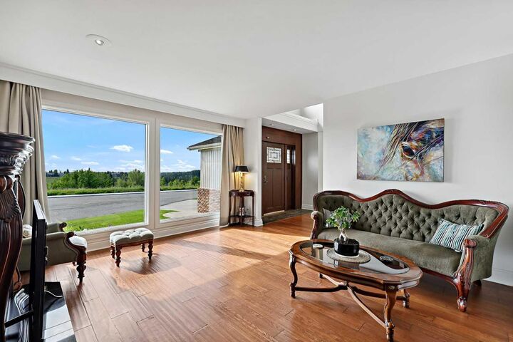 Property Photo:  163 Woodhaven Crescent SW  AB T2W 5R3 