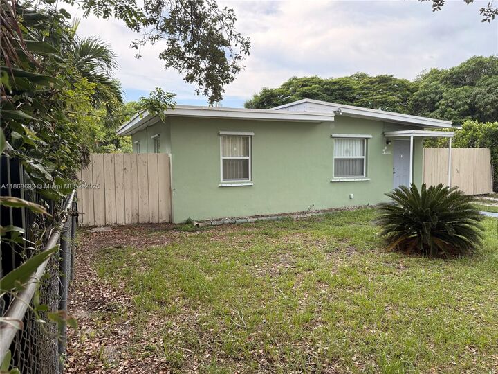 Property Photo: 1060 NW 121st St FL 33168