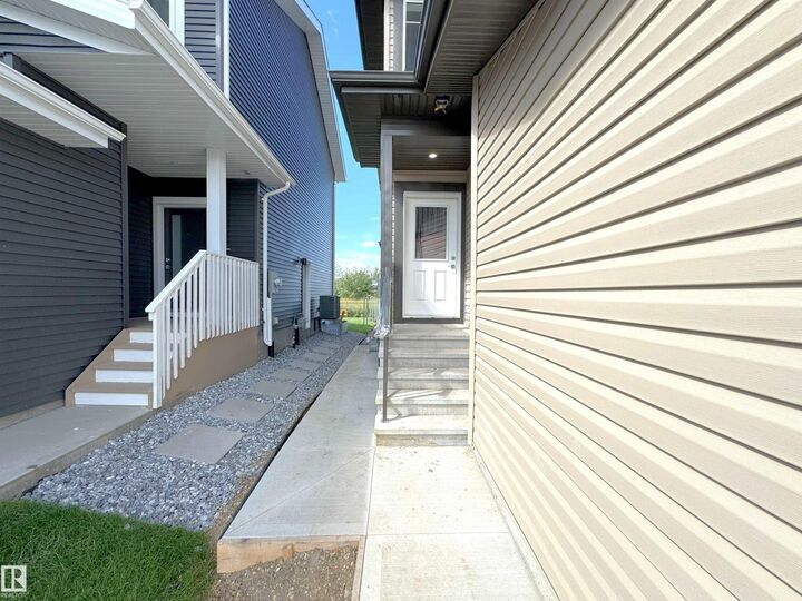 Property Photo: 66 Waverly Wy AB T8L 3L7
