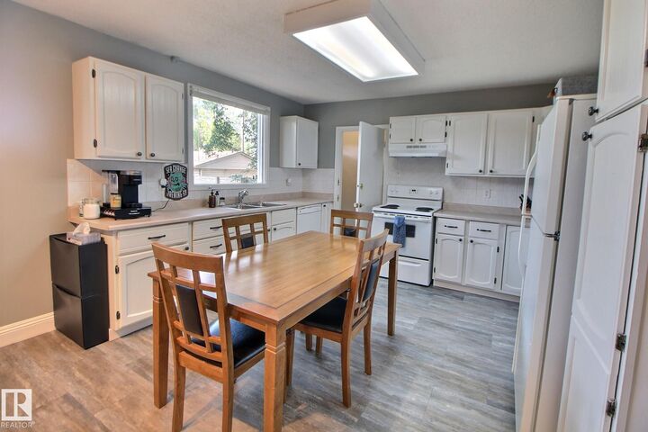 Property Photo: 13208 Sherbrooke Avenue NW AB T5G 4G3