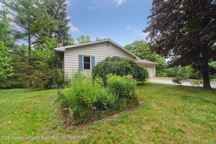 Property Photo: 10015 Burgundy Boulevard MI 48821