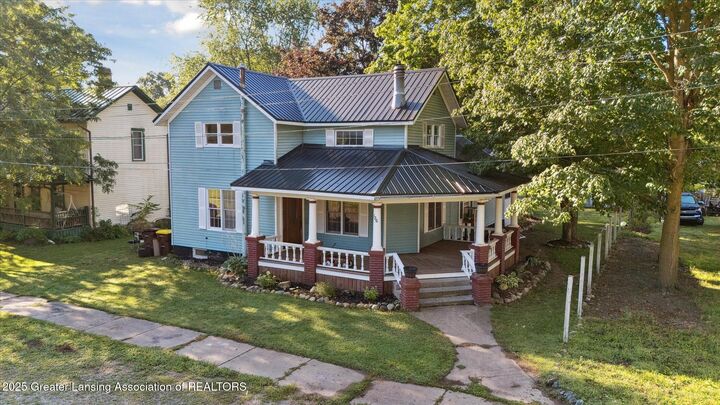 126 E Washington Street  Maple Rapids MI 48853 photo