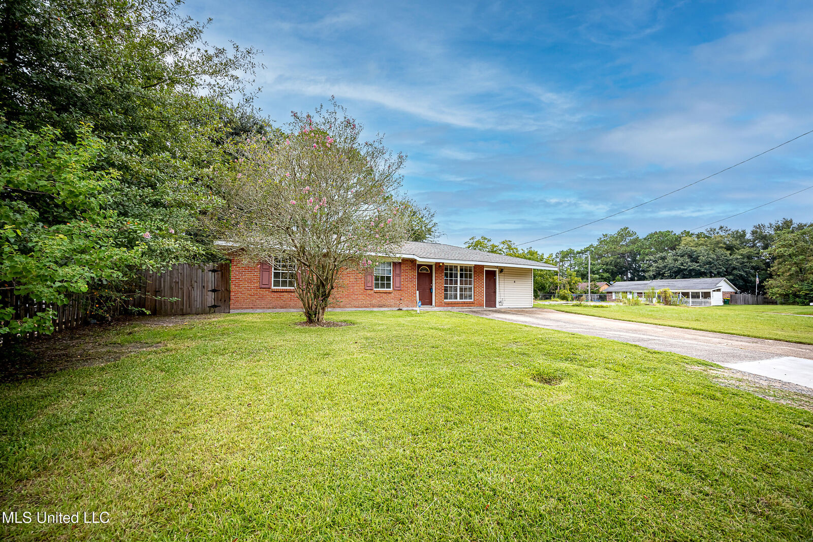 Property Photo:  7646 Madison Drive  MS 39532 