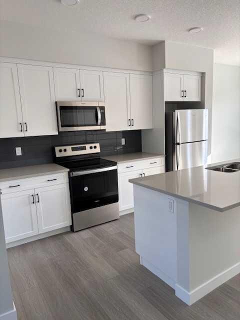 Property Photo: 619 Savanna Crescent NE AB T3J 5P2