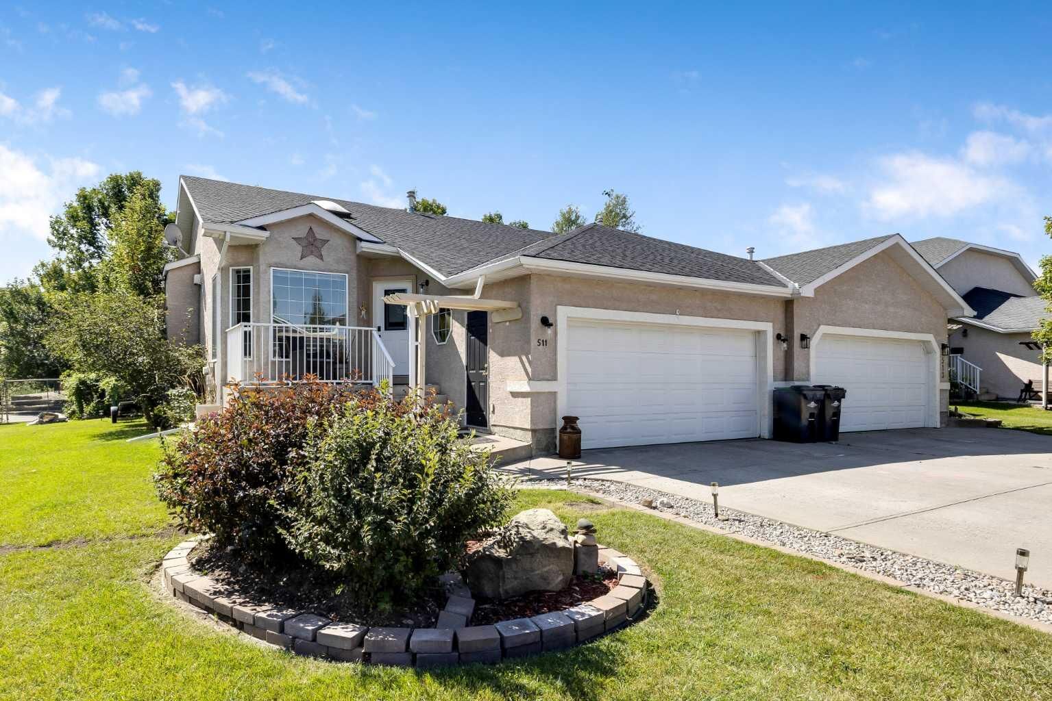 Property Photo:  511 Lineham Acres Drive NW  AB T1C 1T3 