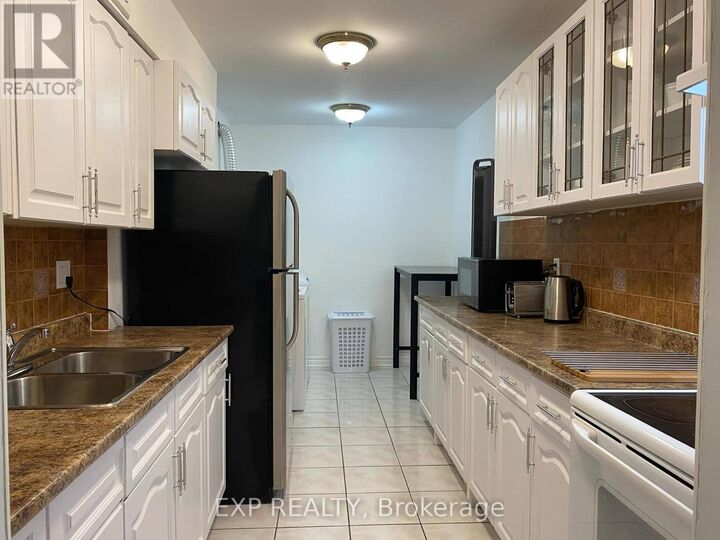 Property Photo:  320 Dixon Road 1813  ON M9R 1S8 