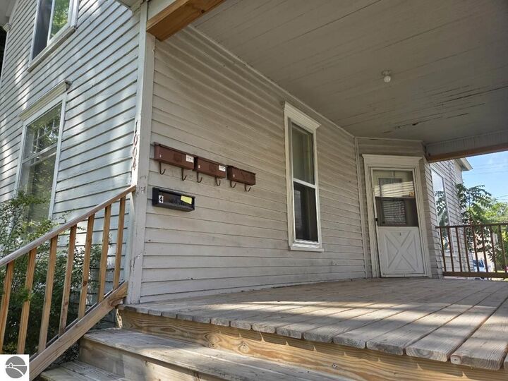 Property Photo:  1004 S University  MI 48858 