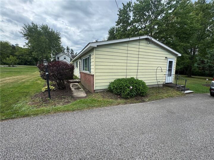 Property Photo:  8810 Auburn Road  OH 44024 