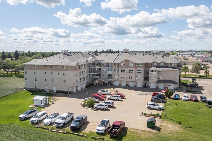 Property Photo:  4623 65 Street 311  AB T4V 4R3 