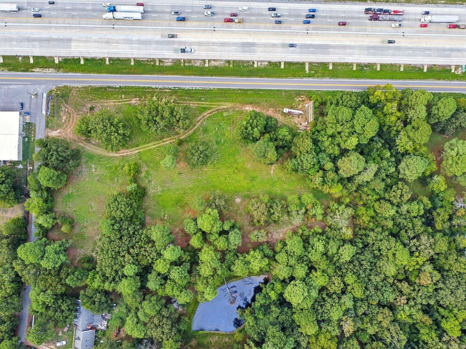 Property Photo:  6 Acres S. Beggs And I-30 Service Road  AR 72015 