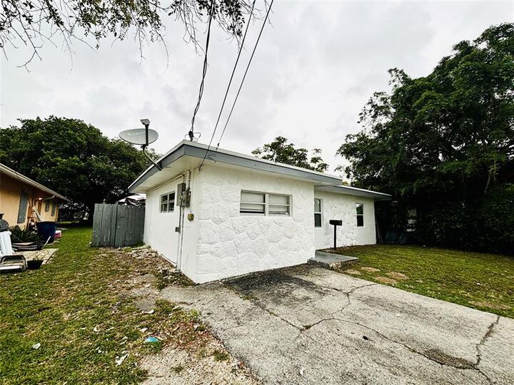 Property Photo: 1025 NW 8th St FL 33009